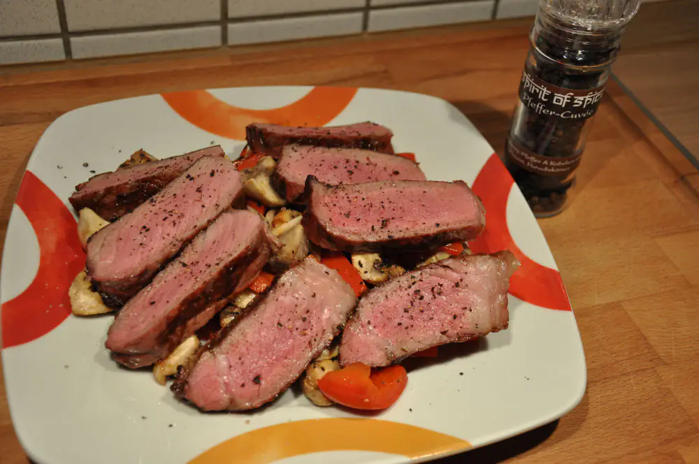 US-Rumpsteak auf Gemüsebett
